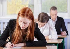 Students during an exam at school, horizontal